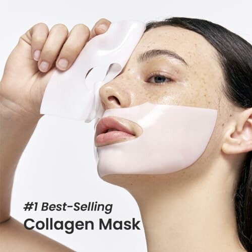 Woman applying collagen mask to face