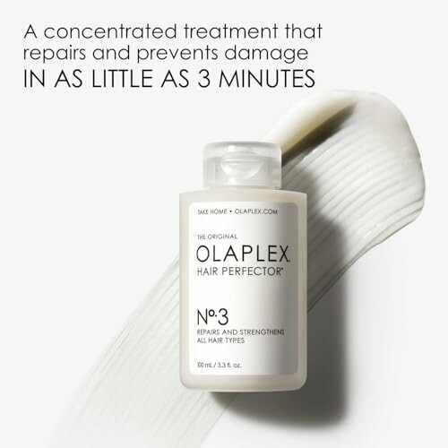 Olaplex No. 3 Hair Perfector treatment bottle with product background